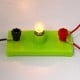 Bulb holder on a base - for experiments and construction of electrical circuits